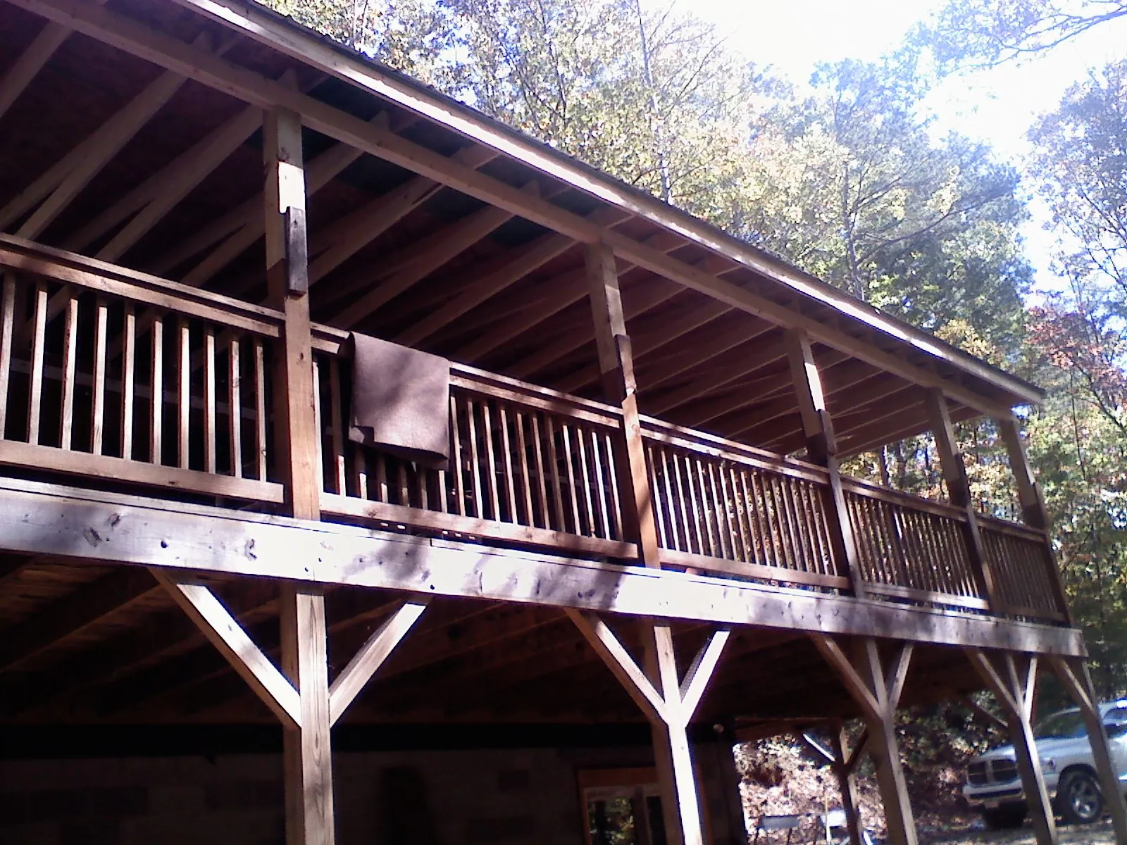 Timber framing under a new elevated porch and deck — Roof Leak Repair in Parlier by Roofing Brothers